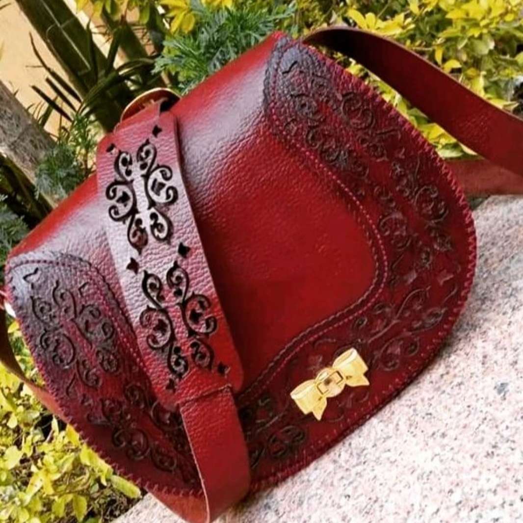 شنطه جلد طبيعي تفريغ