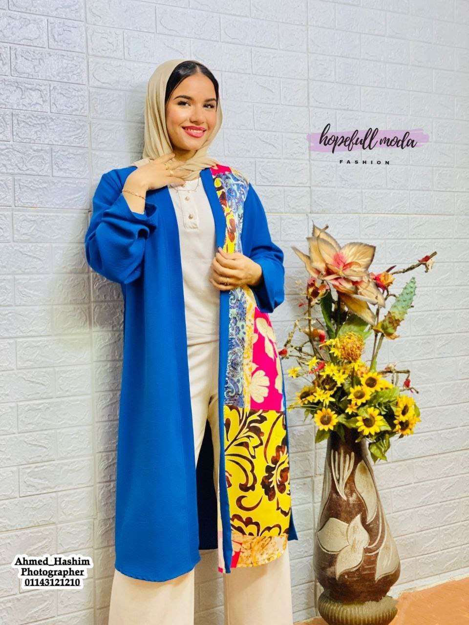 كارديجان كتان سي واي لون ازرق جنب ستان مشجر