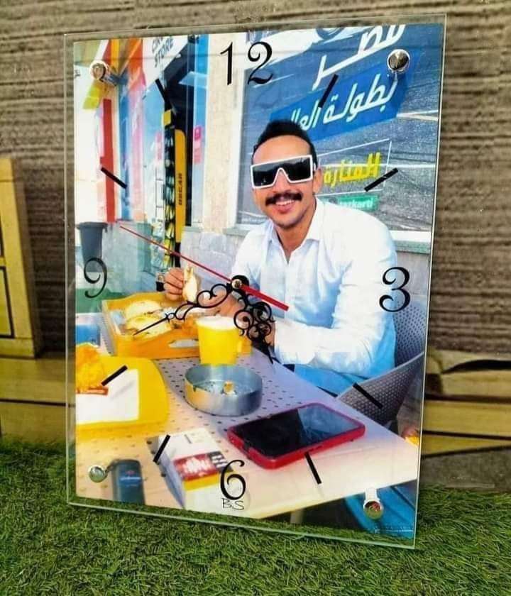 ساعه حائط بالصور