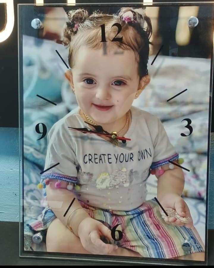 ساعه حائط بالصور