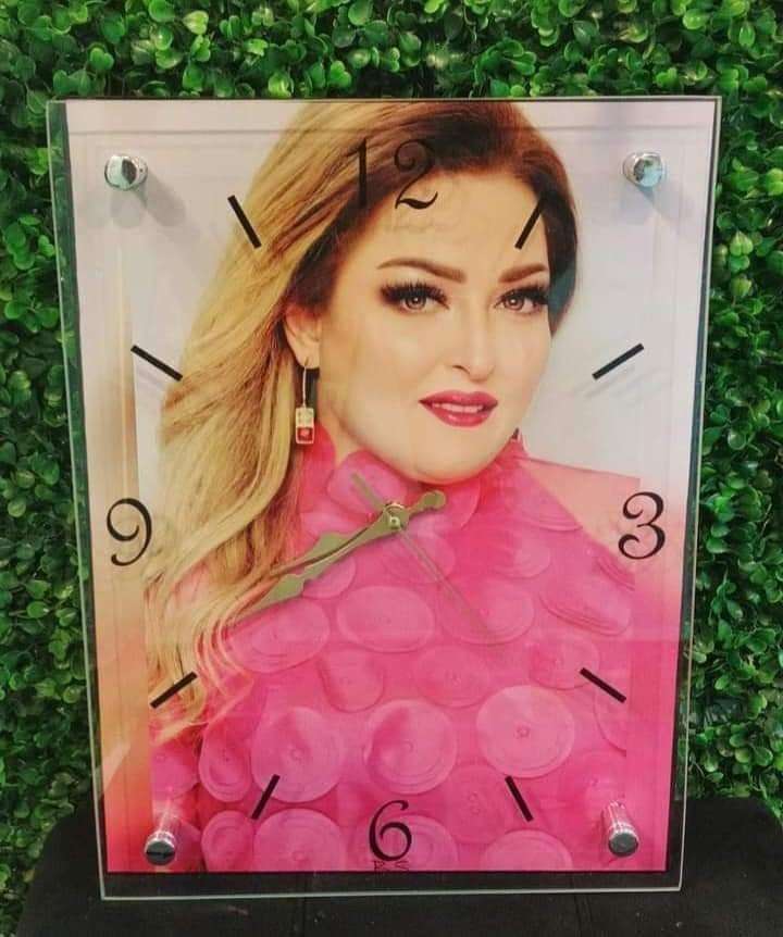 ساعه حائط بالصور