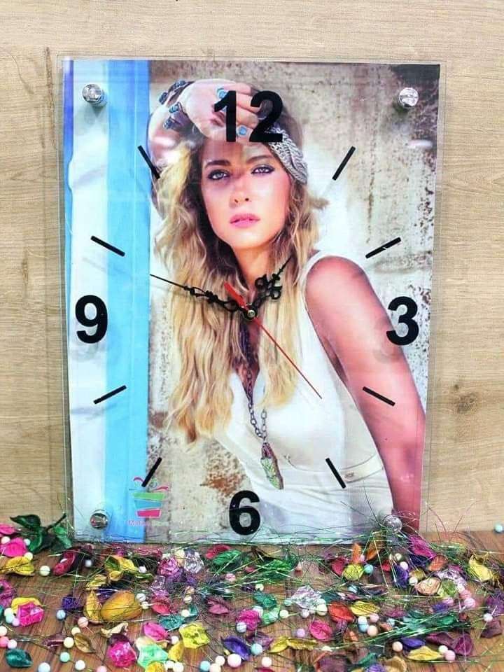 ساعه حائط بالصور