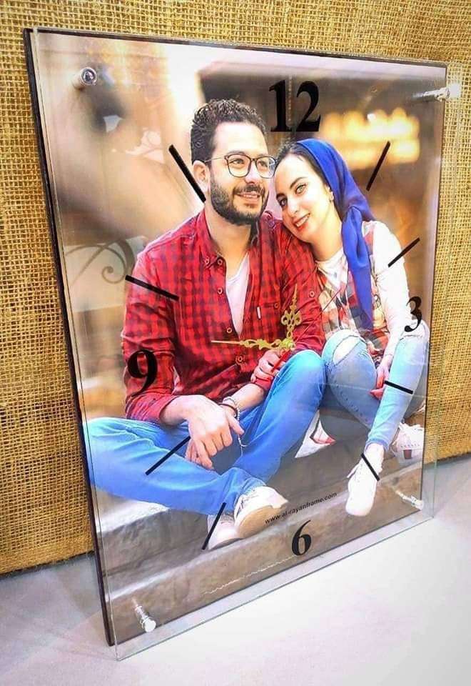 ساعه حائط بالصور