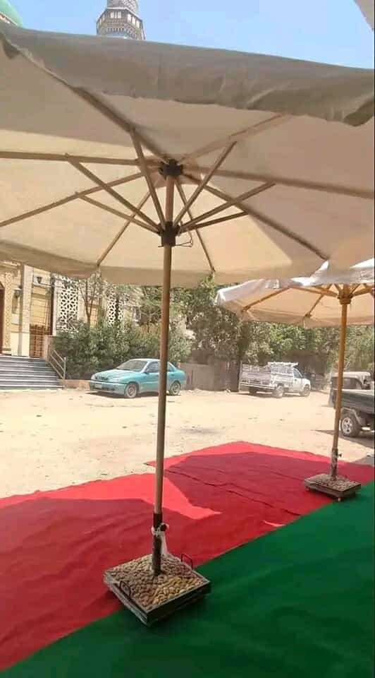 شمسية قماش دوك ٥٥٠ جرام خشب زان احمر بطقم عجل مقاس ٣ فى ٣